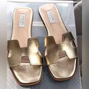 Gold Steve Madden slide on sandals